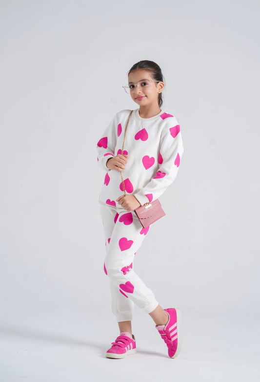 "Playful Style: Girls Tracksuit with Bold Heart Prints 💗"
